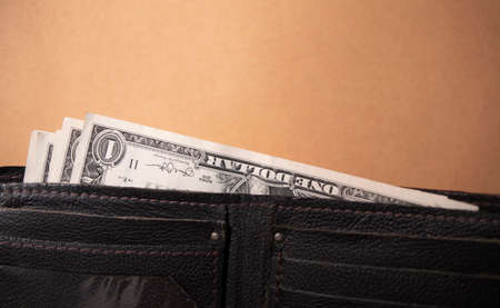 leather wallet with American one dollarの写真素材