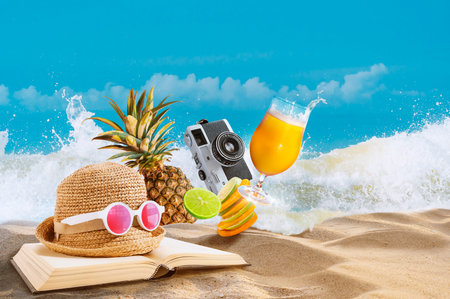 summer holiday, full party with accessories, traditional old film camera, tropical fruit, and drink on the beach.extreme vacation getaway with outdoor activity.sea wave water splashing in backgrounds.の写真素材
