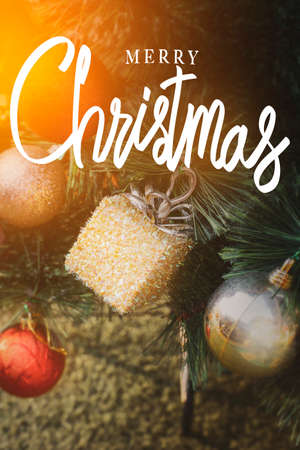 merry Christmas, vintage handwriting on decorated Christmas tree