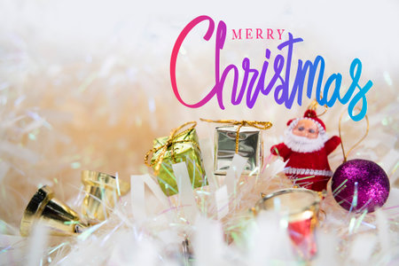 Merry Christmas.Handwriting and Gift Box With Shiny And Defocused glittering Light And Abstract background à¸à¹の写真素材