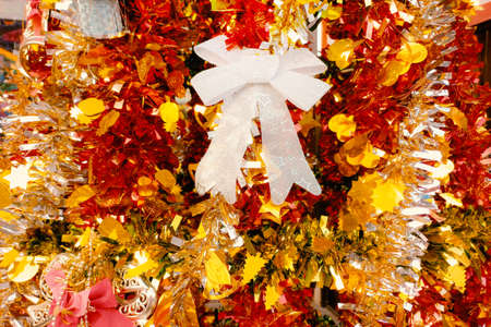 Happy holidays concept. decorated with a bow and colorful ribbons.