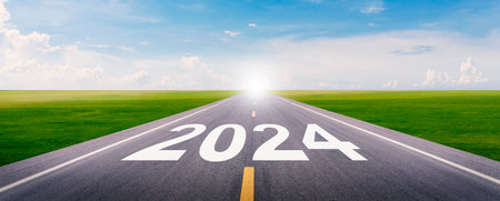 The new year 2024 or straightforward concept. Text 2024 written on the highway road. planning and challenge, new business, business strategy, opportunity, transportation, and logisの写真素材