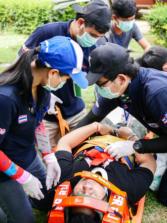 Emergency Medical team packaging traumatic patient after extrication from car accident by using KEDのeditorial素材