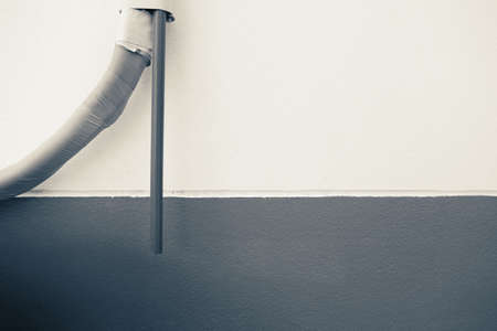 Drain pipe of air conditioner install outside of houseの写真素材