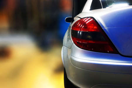 close up back of  gray sport car with blur bokeh backgroundの写真素材