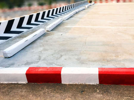 Parking space for cars With a symbol On the floor and footpathの写真素材