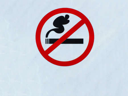 Non smoking sign on white boardの写真素材