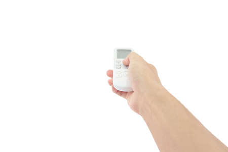 hand of Asian man is hold remote control and press it isolated on white background