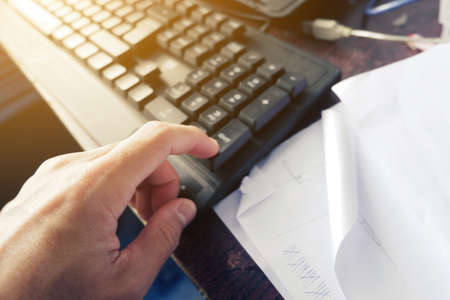 use hand by Forefinger is press at Enter button of computer keyboard