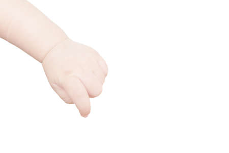 The hand of the infant baby in the age of three months is reach down to touch something  isolated on white backgroundの写真素材