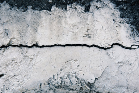 Cracks on the old cement surfaceの写真素材