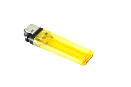 The yellow lighter isolated on white background.の写真素材