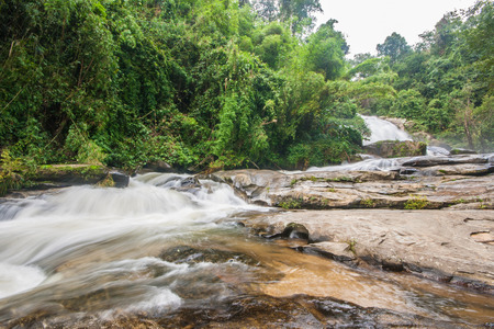 Waterfall in slow shutter speed. Siritharn waterfall, Inthanon national park, Chiangmai, Thailand.の写真素材