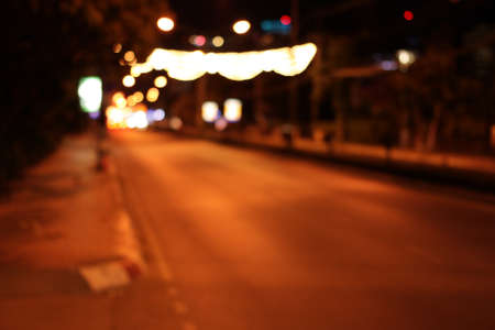 Colorful defocused bokeh lights background. Festive background with natural bokeh. Abstract blur background.の写真素材