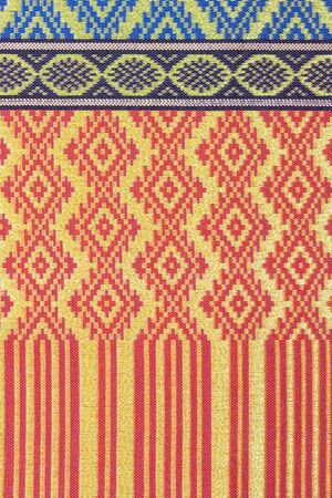 Closeup fabric texture with tradition Thai style pattern use for background. Abstract background.の写真素材