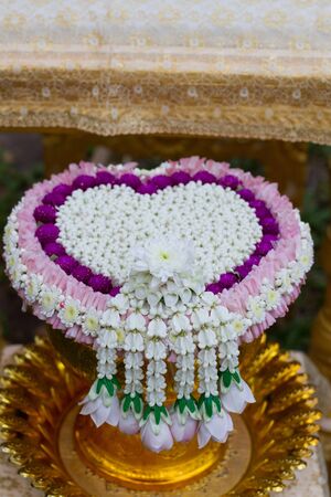 silver bowl filled with flowers for Thai traditional ceremonyの写真素材