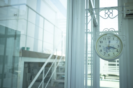 retro clock hanging on the roomの写真素材