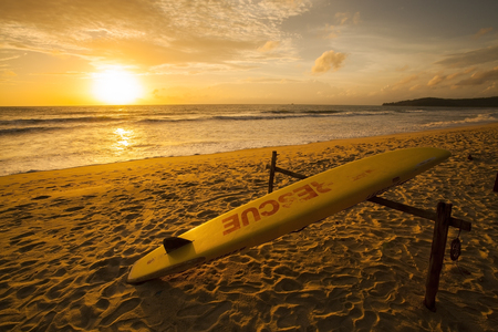 Rescue surfboard on the beach の写真素材