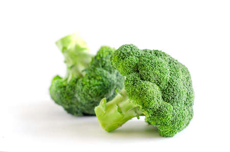 Fresh organic broccoli vegetable piece on white backgroundの写真素材