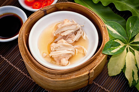 Dim sum in bamboo steamerの写真素材