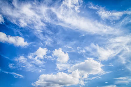 blue sky background with tiny cloudsの写真素材