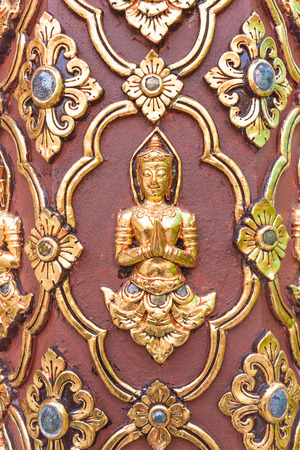 Thai culture sculpture on the temple wall .の写真素材