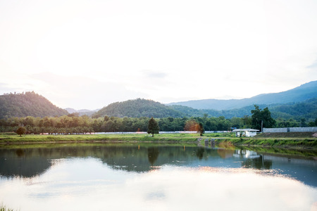 Landscape and Reflection of nature in the river at evening .の写真素材
