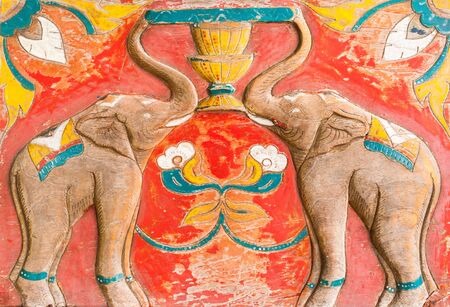 Carved Thai of elephant on the wood.の写真素材