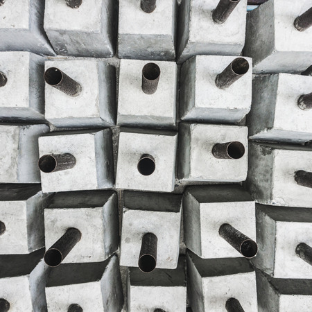 abstract iron post in concrete base background.の写真素材