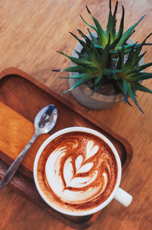 Hot Coffee on wooden table.の写真素材