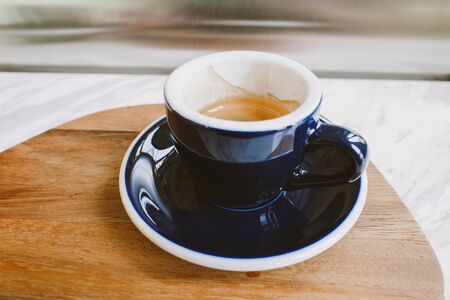 Cup of coffee espresso with foam on top view with copy space. Coffee backgroundの写真素材