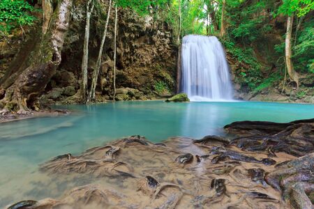 beautiful waterfall at national park in Thailandの写真素材