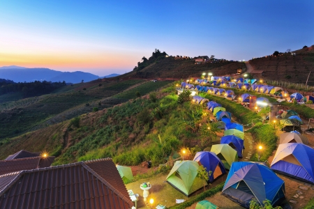 camping tent at dawn on the mountain in Chiangmai Thailandの写真素材
