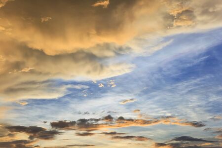 vivid sunset sky and rainy cloudの写真素材