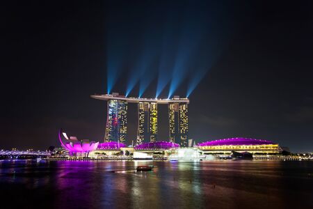 SINGAPORE - APRIL 15   Laser show of Singapore Marina Bay Sand on April 15, 2013, Singapore  Marina Bay Sands is billed as the worldのeditorial素材