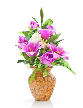 artificial flower arrangement on white backgroundの写真素材