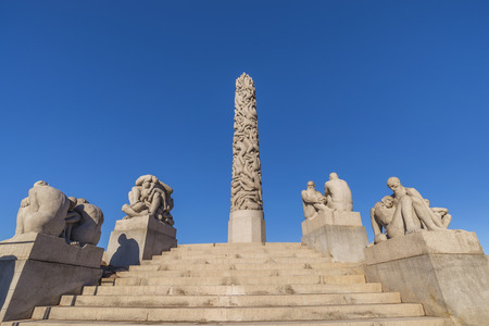 OSLO, NORWAY - APRIL 6, 2018: Oslo city skyline at famous Statue in Vigeland Sculpture Park, Oslo, Norwayのeditorial素材