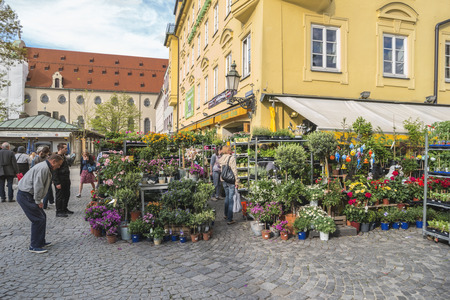 Munich, GERMANY - MAY 13, 2017: Munich Germany, flowers shop at Victuals Market (Viktualienmarkt)のeditorial素材