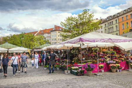 Munich, GERMANY - MAY 13, 2017: Munich Germany, flowers shop at Victuals Market (Viktualienmarkt)のeditorial素材