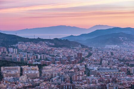 Barcelona Spain, high angle view sunrise city skyline from Bunkers del Carmelの写真素材