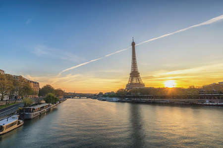 Paris France sunrise city skyline at Eiffel Tower and Seine River