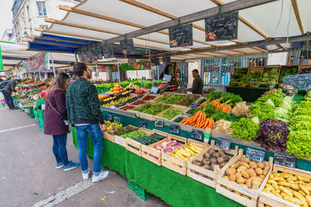 Paris, France - May 4, 2017: fresh vegetable retail shop at Aligre Market in Parisのeditorial素材