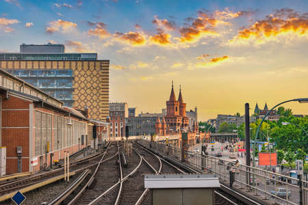 Berlin Germany, sunset city skyline at Oberbaum Bridge and Berlin Metro