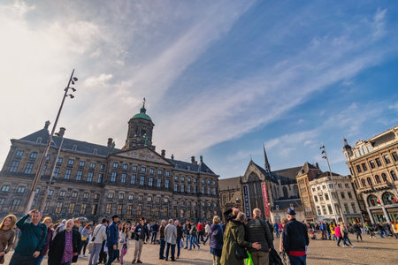 Amsterdam, Netherlands - April 14, 2019: many tourist walking at Dam Square National Monumentのeditorial素材