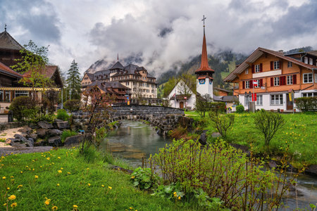 Kandersteg Switzerland, city skyline at Kander River and Evangelical churchの写真素材