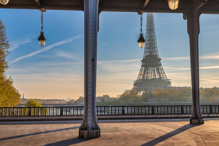 Paris France, sunrise city skyline at Eiffel Tower and Seine River Bir-Hakeim Bridgeの写真素材