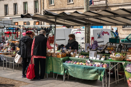 Paris, France - April 4, 2019: city skyline at Place de la Bastille market with many shop and touristのeditorial素材