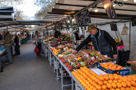 Paris, France - April 4, 2019: city skyline at Place de la Bastille market with many shop and touristのeditorial素材