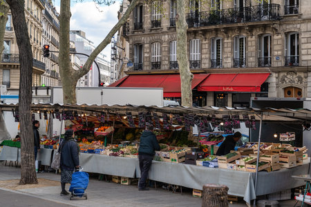 Paris, France - April 4, 2019: city skyline at Place de la Bastille market with many shop and touristのeditorial素材