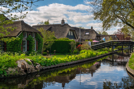 Giethoorn Netherlands, city skyline at canal and traditional house in Giethoorn villageの写真素材